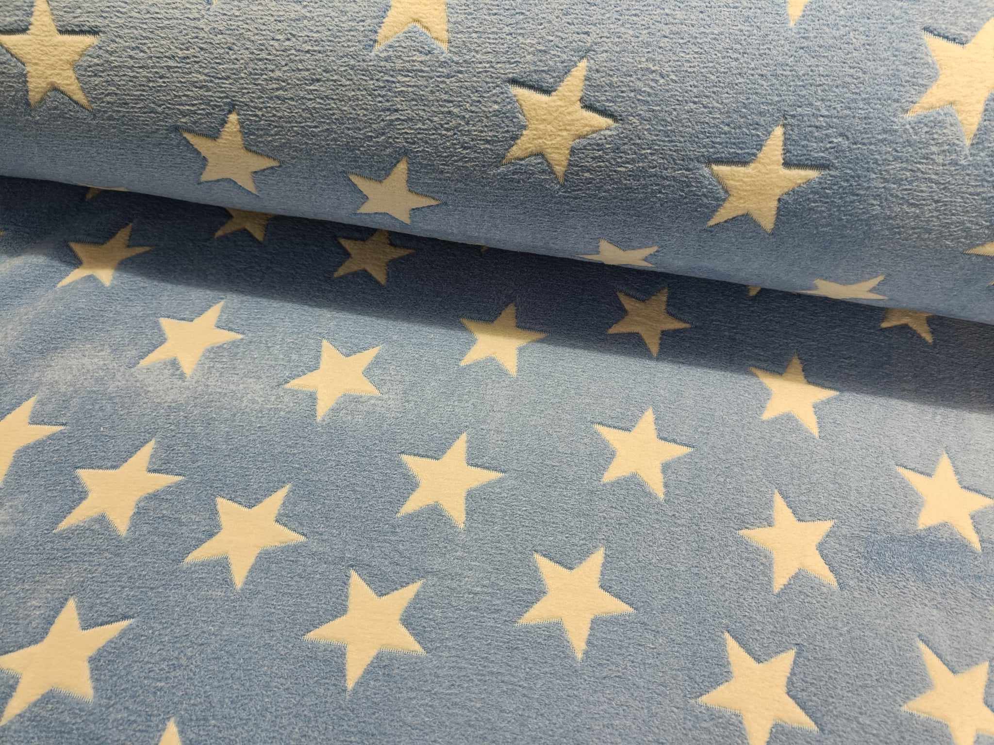 FLEECE - LYSEBLÅ MED GRÅ STJERNER